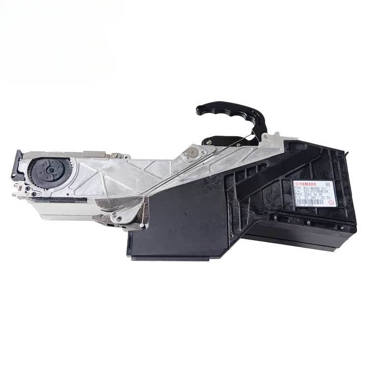 Yamaha SMT tape feeder, side view showing handle, feeder body and identification label